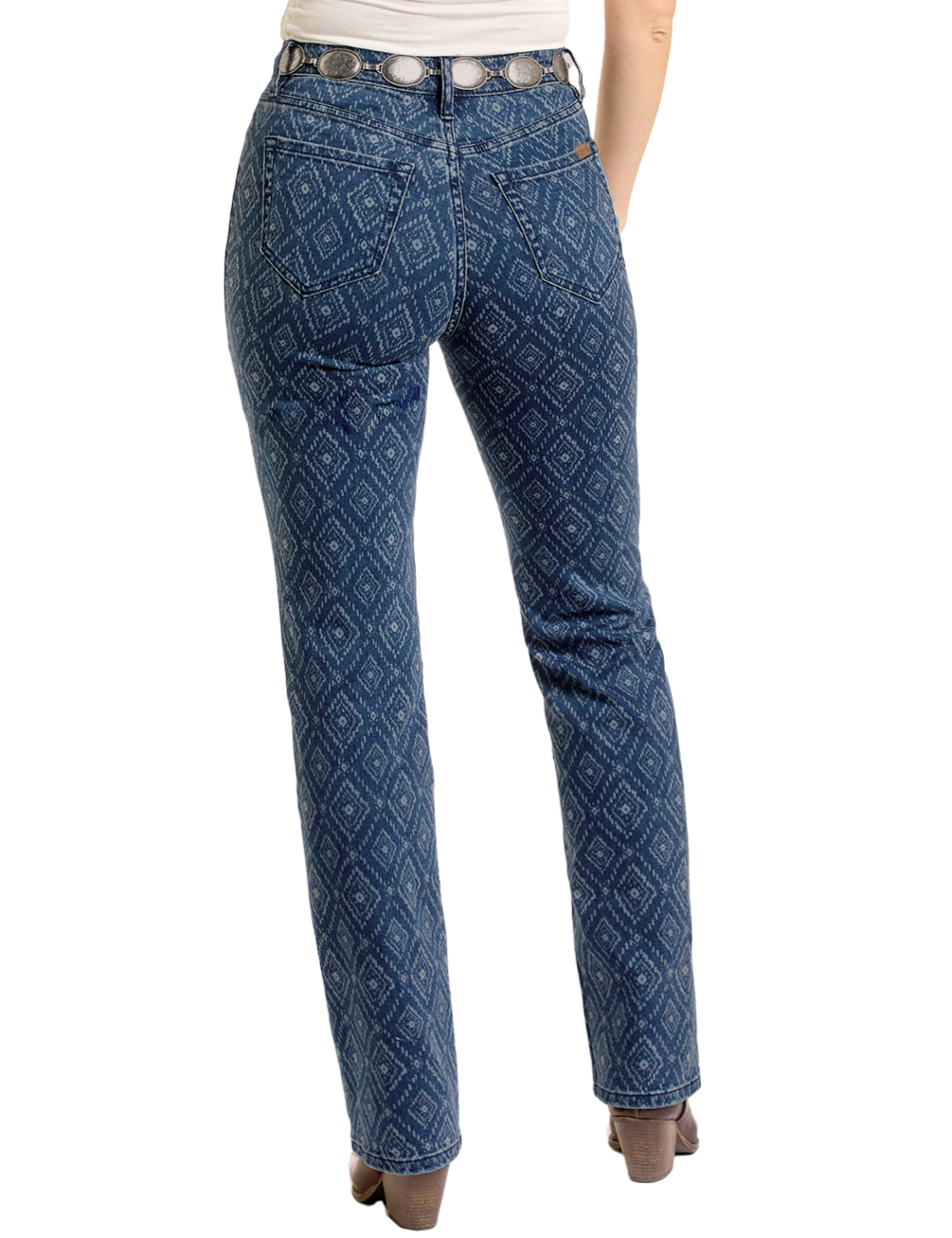 A person is seen from the back wearing Rock & Roll Denim's High Rise Diamond Bootcut Jeans in blue with a white geometric pattern, paired with a white top and silver belt.