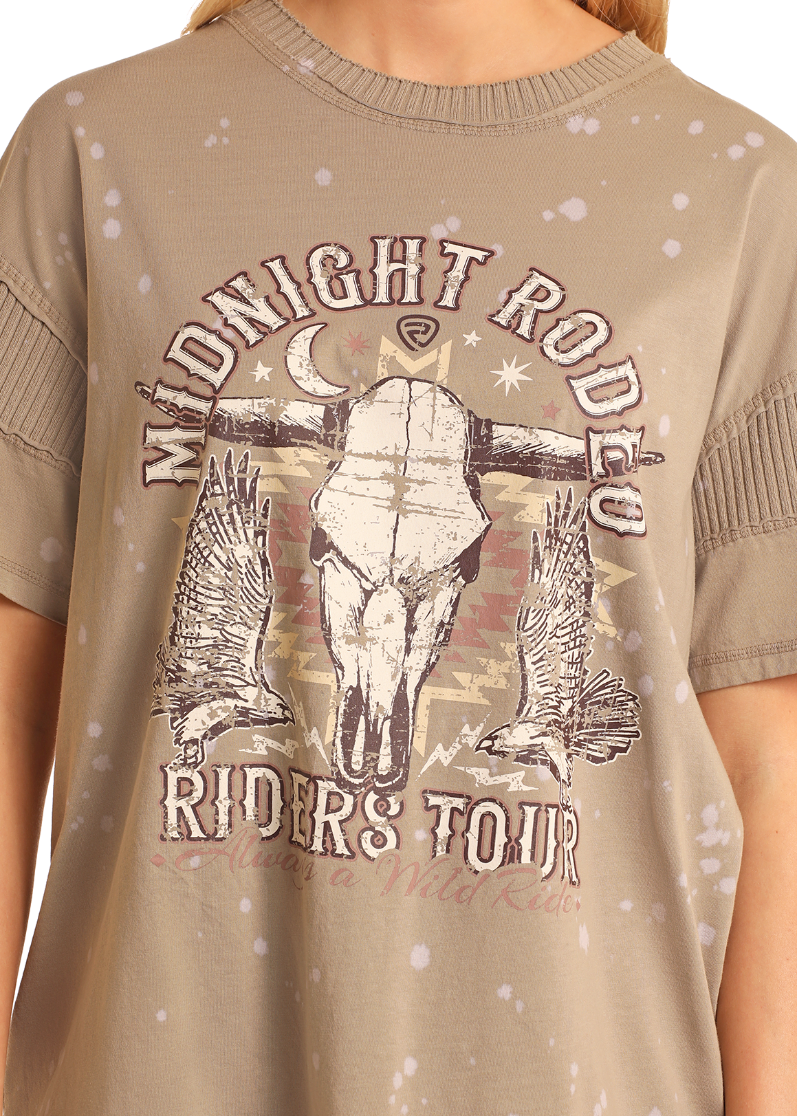 A close-up of the Rock & Roll Denim Midnight Rodeo Graphic Oversized T-Shirt featuring MIDNIGHT RODEO RIDERS TOUR text, a steer skull, two eagles, stars, a crescent moon, and faded white spots for cool casual style.