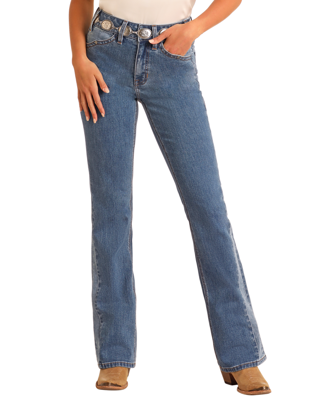 A person wears Rock & Roll Denim High Rise Two-Tone Detail Bootcut Jeans, a white top, a brown belt with large silver buckles, and tan heeled boots, standing against a plain light background.