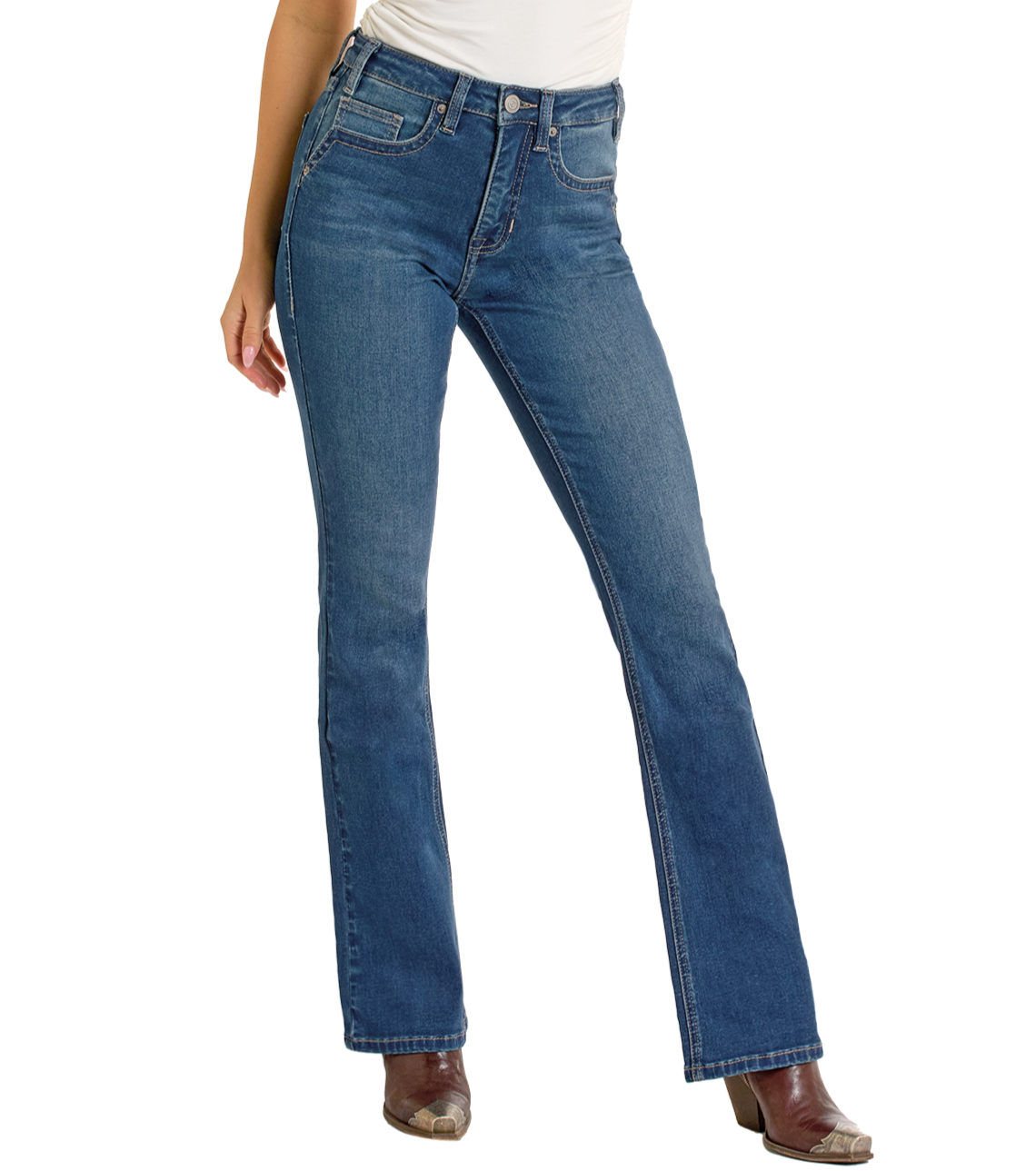 A person in Rock & Roll Denim High Rise Two Tone Bootcut Jeans with front and back pockets, a white top, and brown heeled boots stands against a plain white background. The jeans have visible stitching.