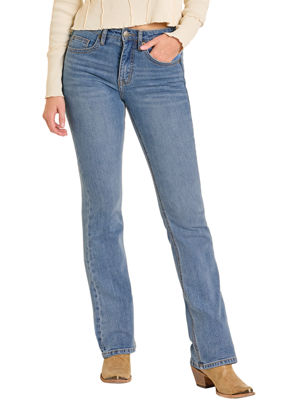 A person wearing Rock & Roll Denim High Rise Yoke Stitch Bootcut Jeans, a light beige long-sleeve top, and tan heeled boots stands with one hand in their pocket against a plain background.