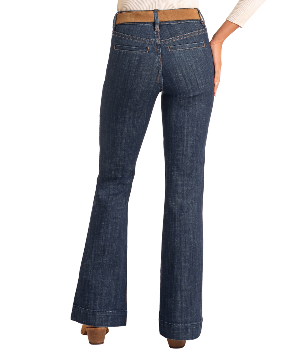 A person is shown from the back wearing Rock & Roll Denim High Rise Welt Pocket Trouser Jeans and tan heeled shoes, with one hand on their hip against a plain light background.