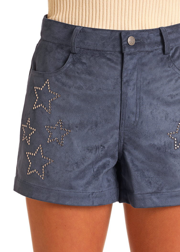 A person wearing Rock & Roll Denim's Star Studded Microsuede Shorts.