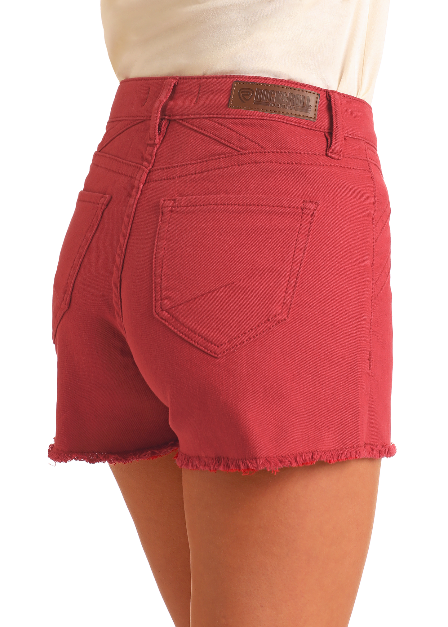 Red shorts with a visible brand label on a white background