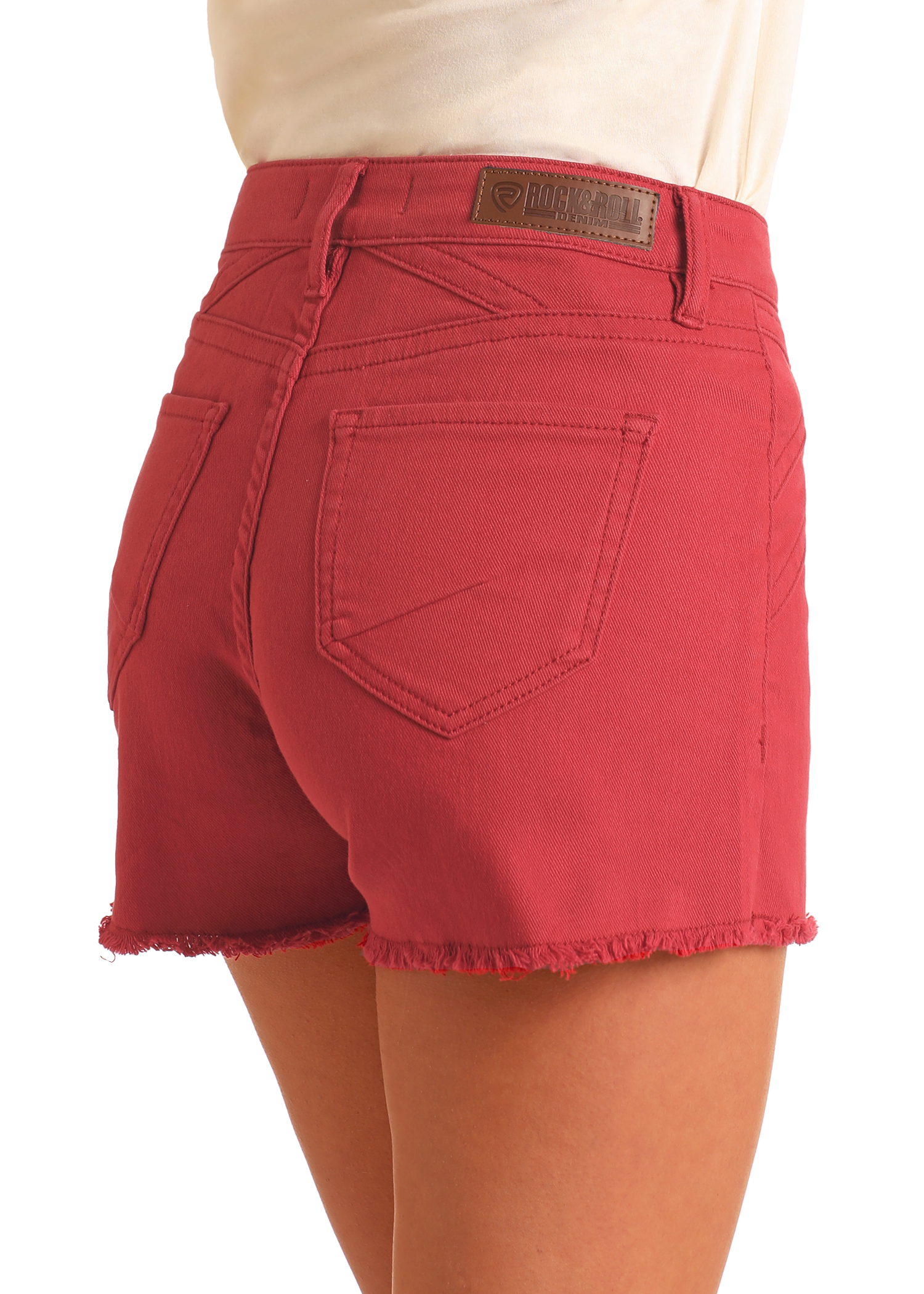 Red shorts with a visible brand label on a white background