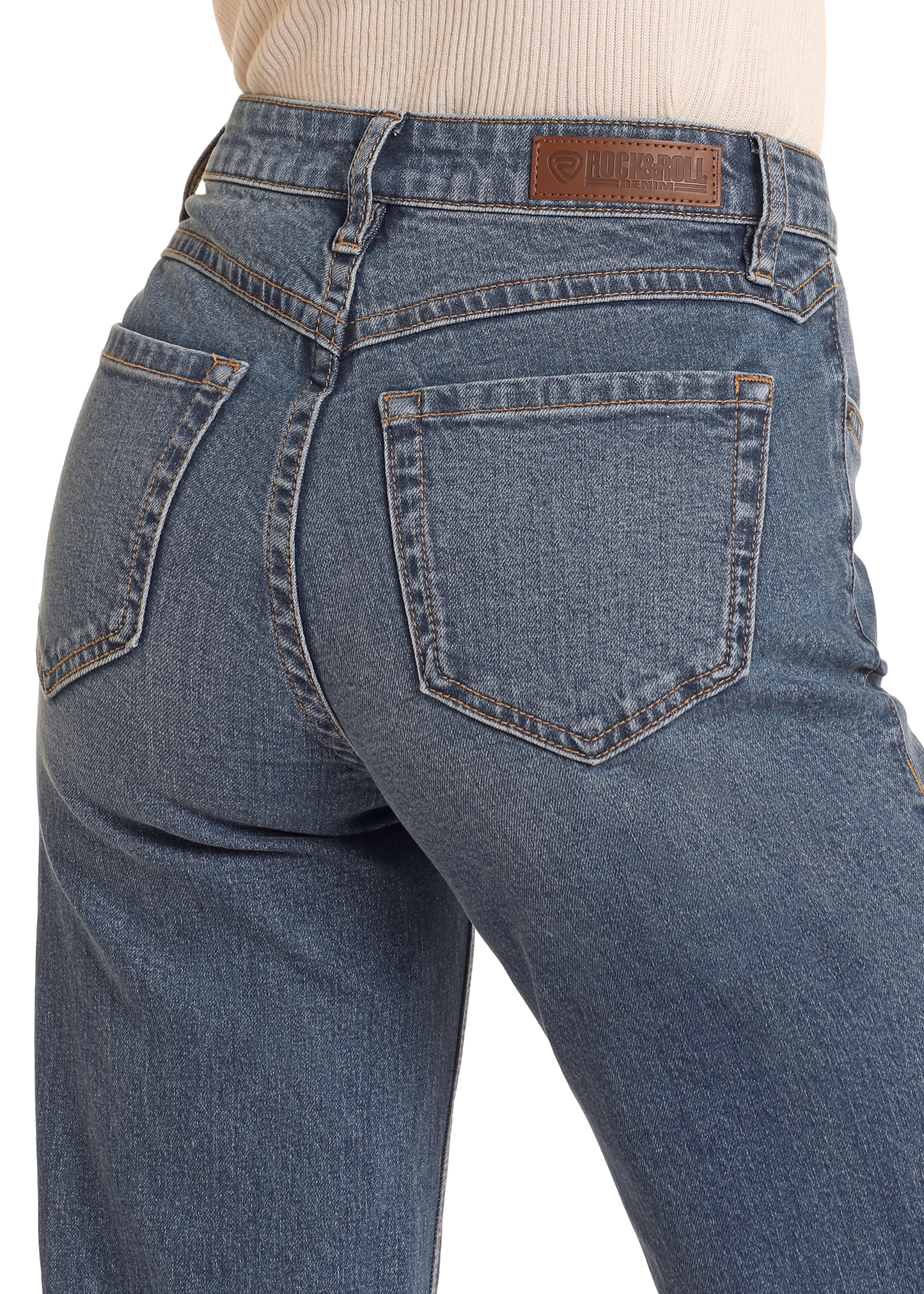 A close-up shows the back of a person wearing Rock & Roll Denim High Rise Distressed Relaxed Flare Jeans, which feature two back pockets, belt loops, and a brown leather brand patch on the cotton denim waistband.