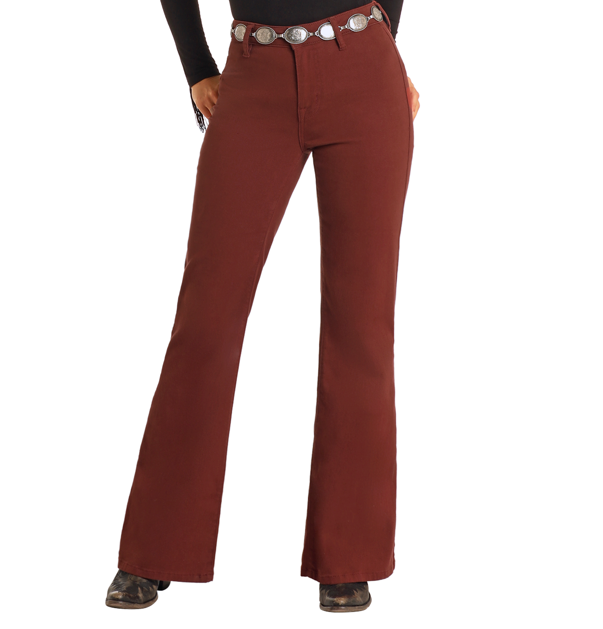 A person wears Rock & Roll Denim High Rise Wide Leg Flare Jeans in brown with a black long-sleeve top, silver concho belt, and black shoes. Image shows view from shoulders to feet.