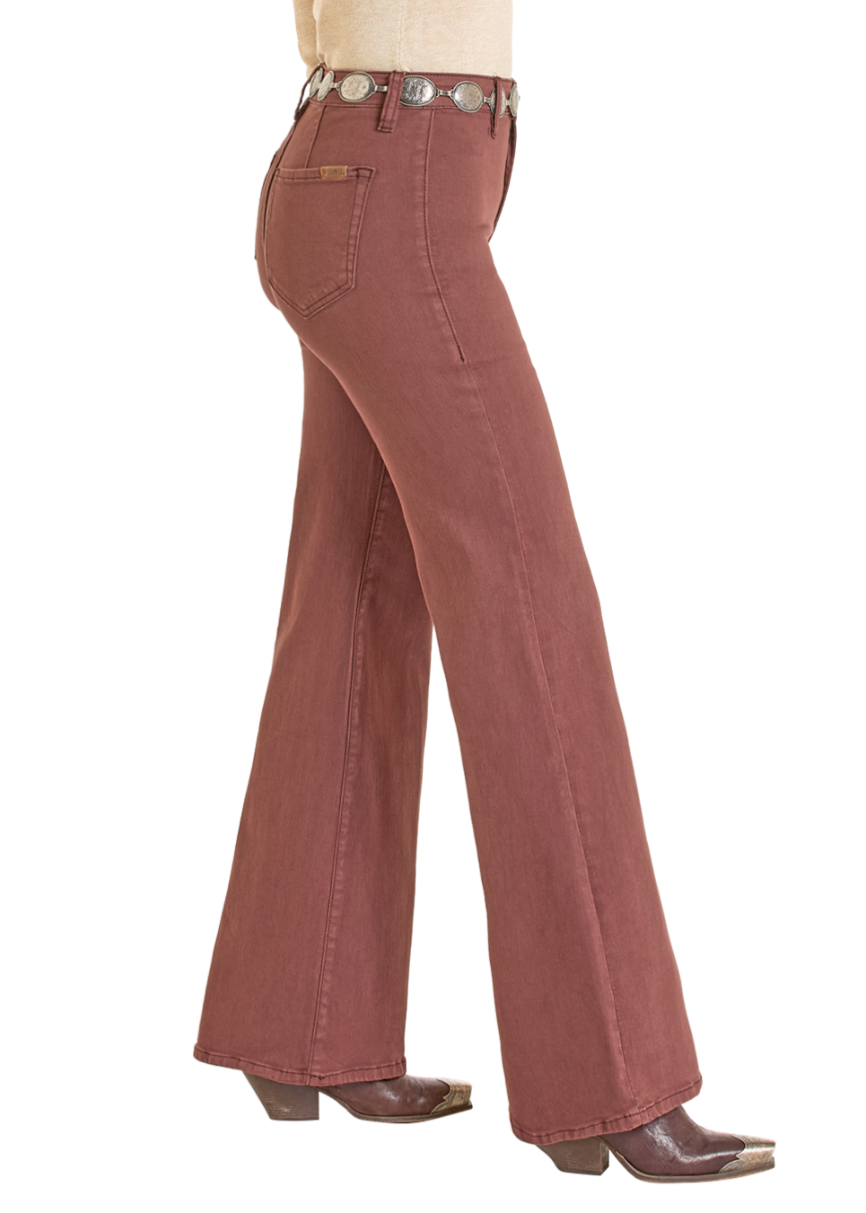 A person models the Rock & Roll Denim High Rise Wine Button Flare Jeans with a decorative belt and brown heeled boots, shown in profile against a white background.