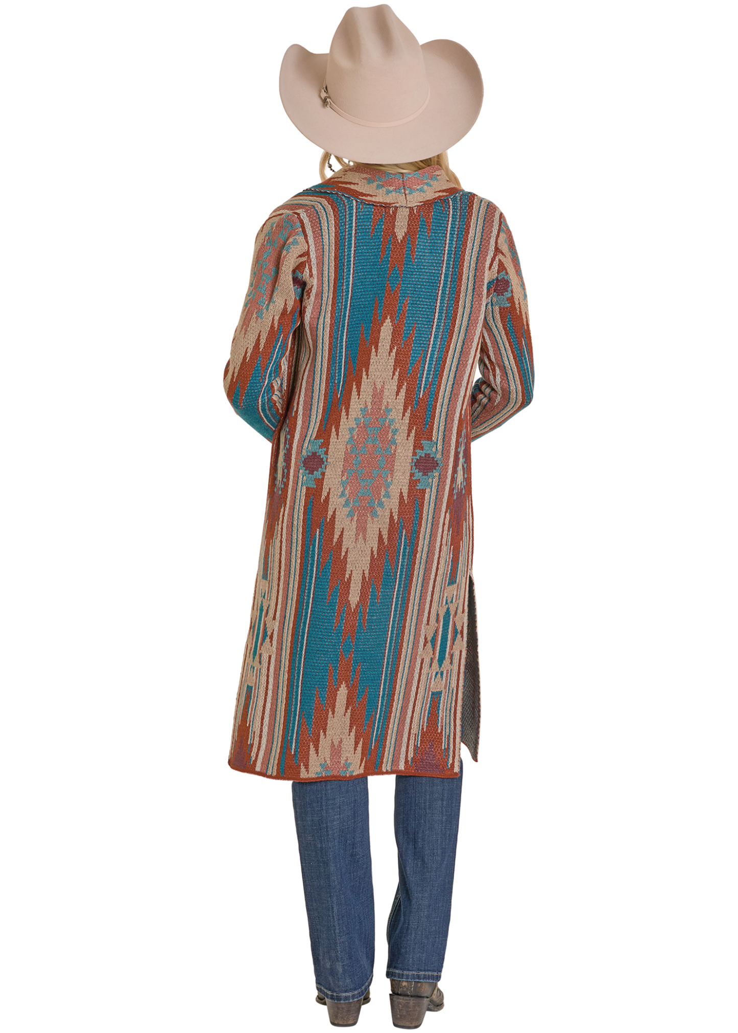 Person wearing a colorful patterned shirt and blue jeans with a cowboy hat on a white background