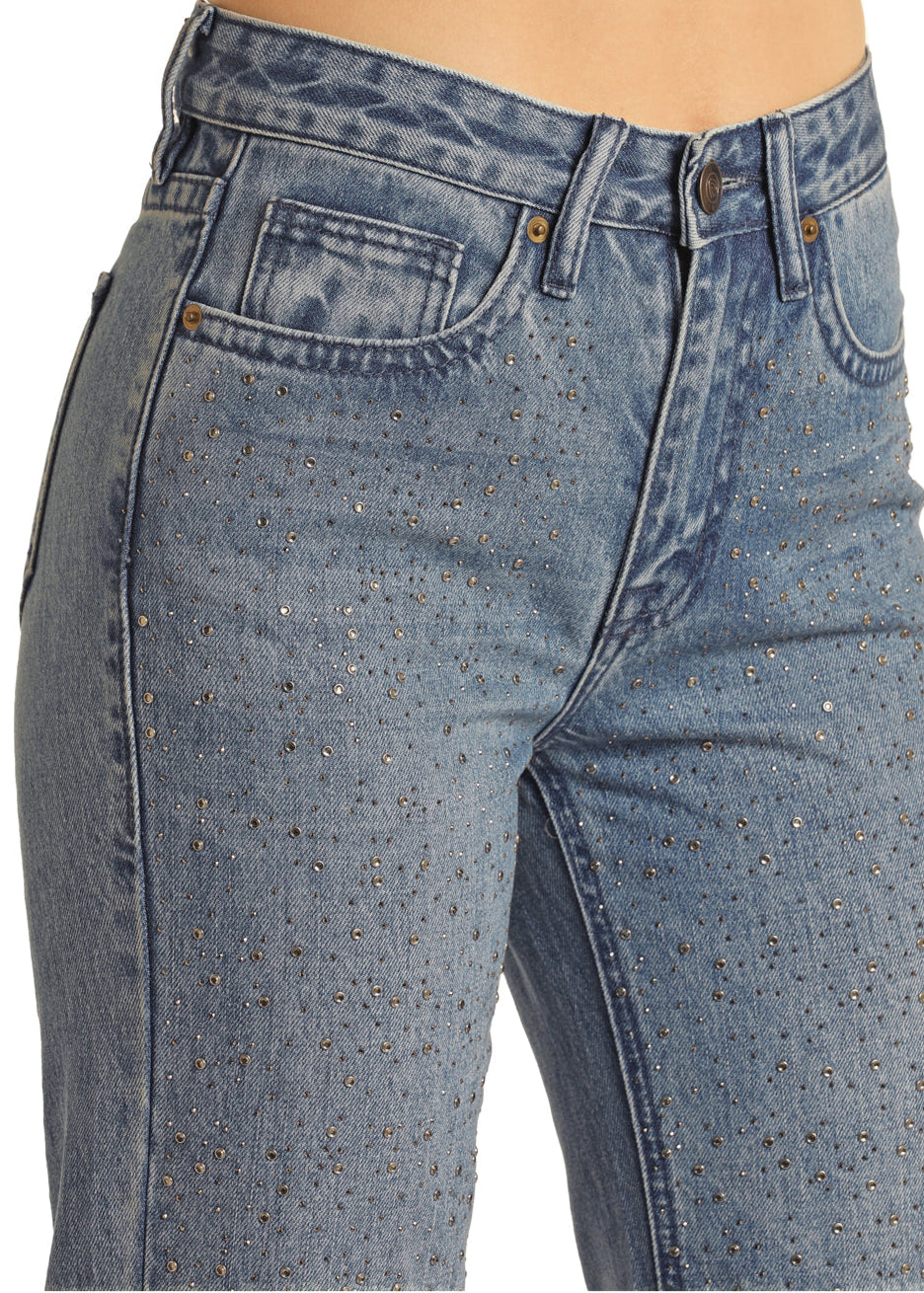 Close-up of blue jeans with a white background