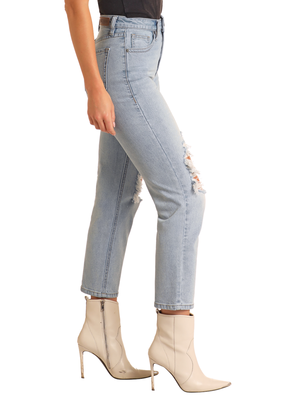 A person wearing Rock & Roll Denim High Rise Distressed Straight Cropped Jeans in light blue with beige heeled ankle boots, shown from the side against a white background.