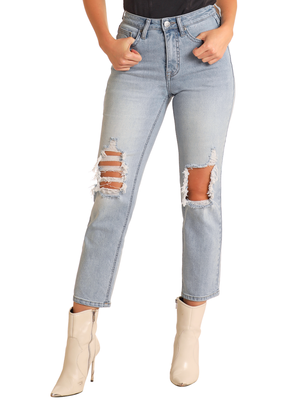 A person stands against a plain background wearing Rock & Roll Denim High Rise Distressed Straight Cropped Jeans in light blue, featuring large knee and thigh rips, paired with a black top and cream ankle boots.