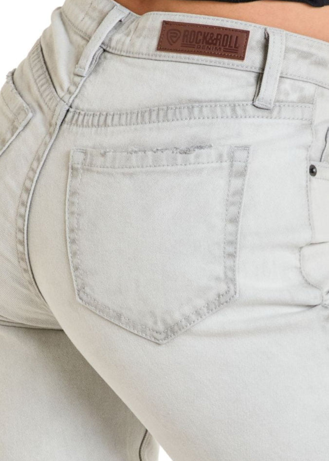 Light-colored jeans worn by a person on a white background