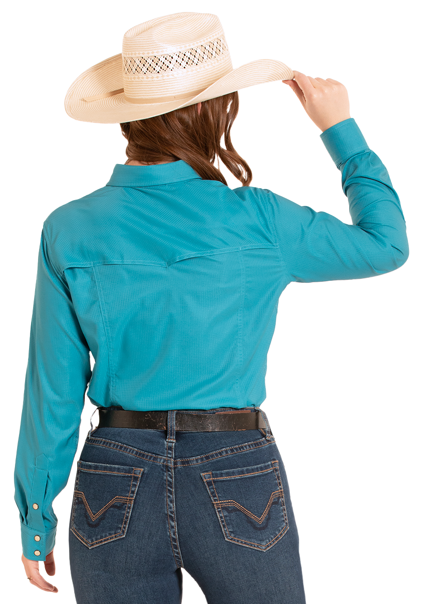 Person wearing a turquoise shirt and blue jeans with a white background
