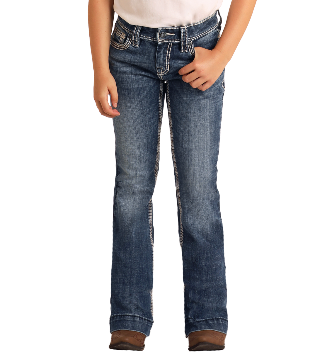 A child stands against a plain white background wearing a white shirt, brown shoes, and Rock & Roll Denim Girls' Heavy Stitch Trouser Jeans featuring bold white stitching.