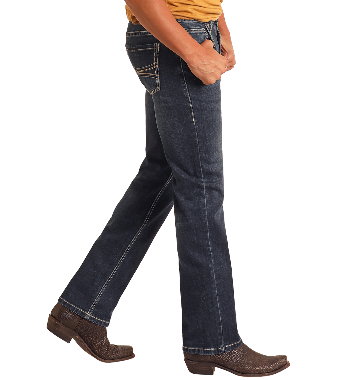 A person wearing Rock & Roll Denim Hooey Slim Fit Barbed Stitch Straight Leg Jeans in dark blue, a mustard yellow shirt, and brown cowboy boots is shown walking from the waist down against a white background.