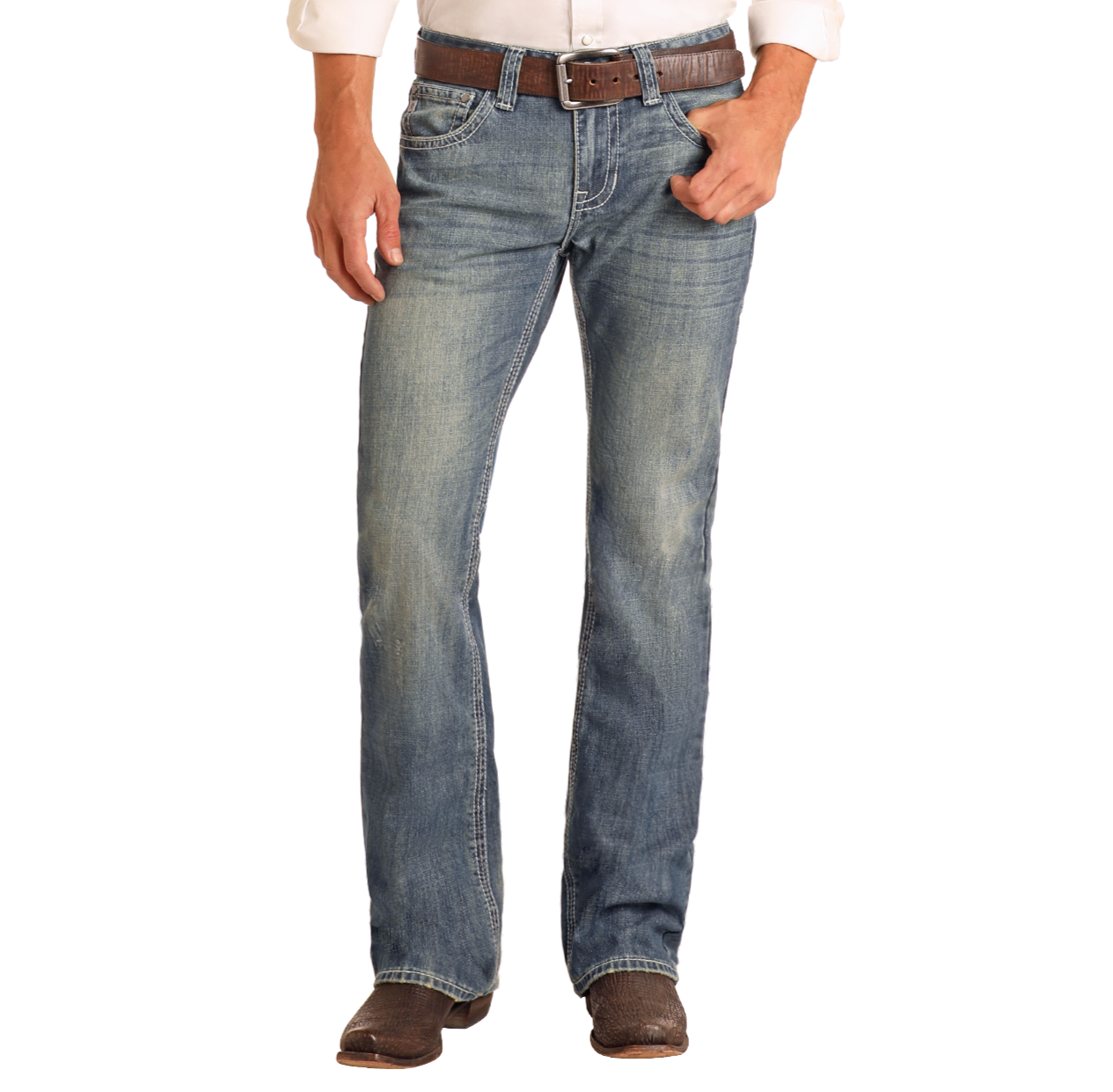 A person wearing Rock & Roll Denim Regular Fit Ivory Top-Stitching Bootcut Jeans, a brown belt, brown boots, and a white rolled-sleeve shirt stands with one hand in their pocket against a white background.