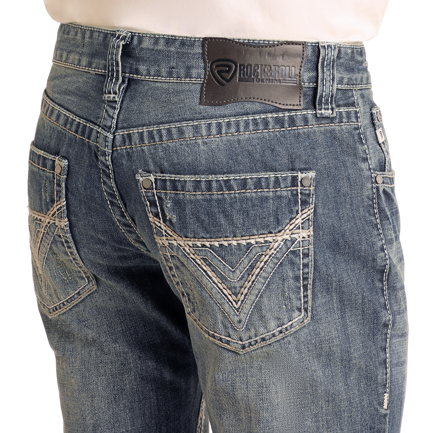 Close-up of the back of a person wearing Rock & Roll Denim Regular Fit Ivory Top-Stitching Bootcut Jeans featuring ivory pocket stitching, classic bootcut styling, and a dark leather brand patch on the waistband.
