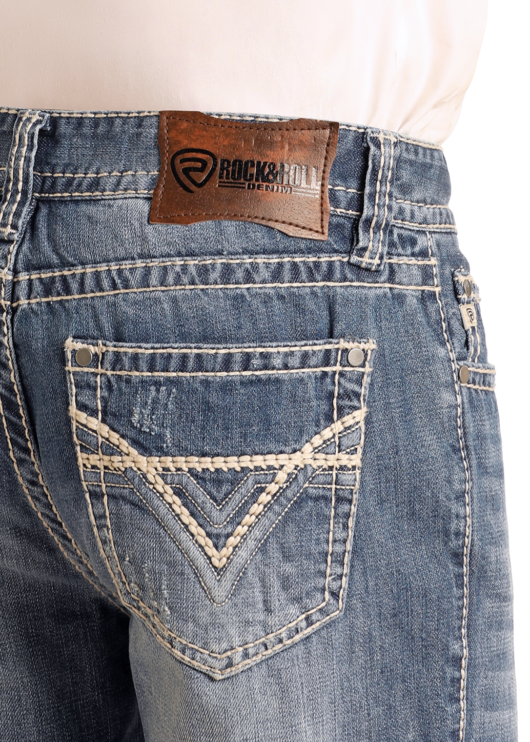 Close-up of the back of a person wearing Relaxed Fit Large V Straight Leg Jeans by Rock & Roll Denim, featuring blue 100% cotton denim, white stitching, a leather brand patch on the waistband, and V-shaped designs on the back pockets.