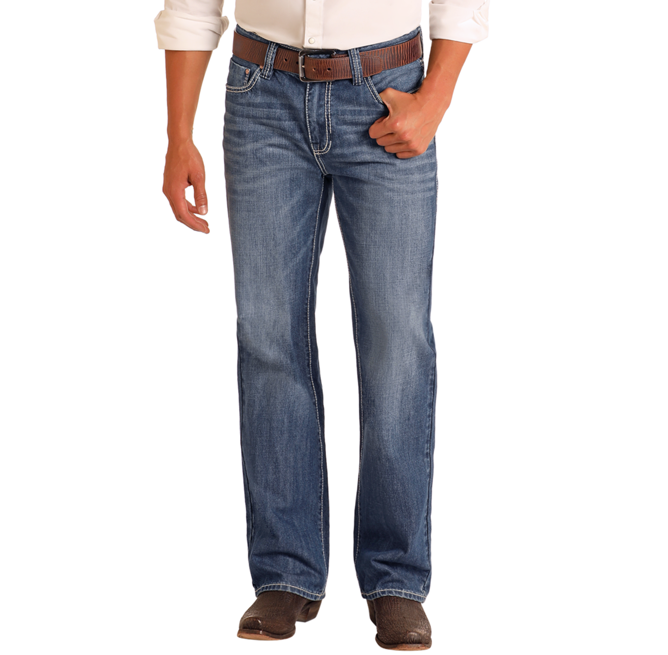 A person wears Rock & Roll Denim Relaxed Fit Medium Wash Straight Leg Jeans, a brown belt, white shirt, and brown shoes against a plain light background, with their left hand in their pocket.