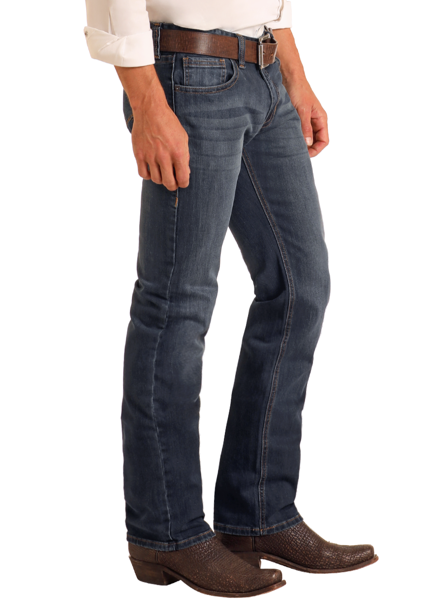 A person wearing a white shirt, brown belt, brown cowboy boots, and Rock & Roll Denim Slim Fit Dark Wash Straight Leg Jeans stands against a plain white background.