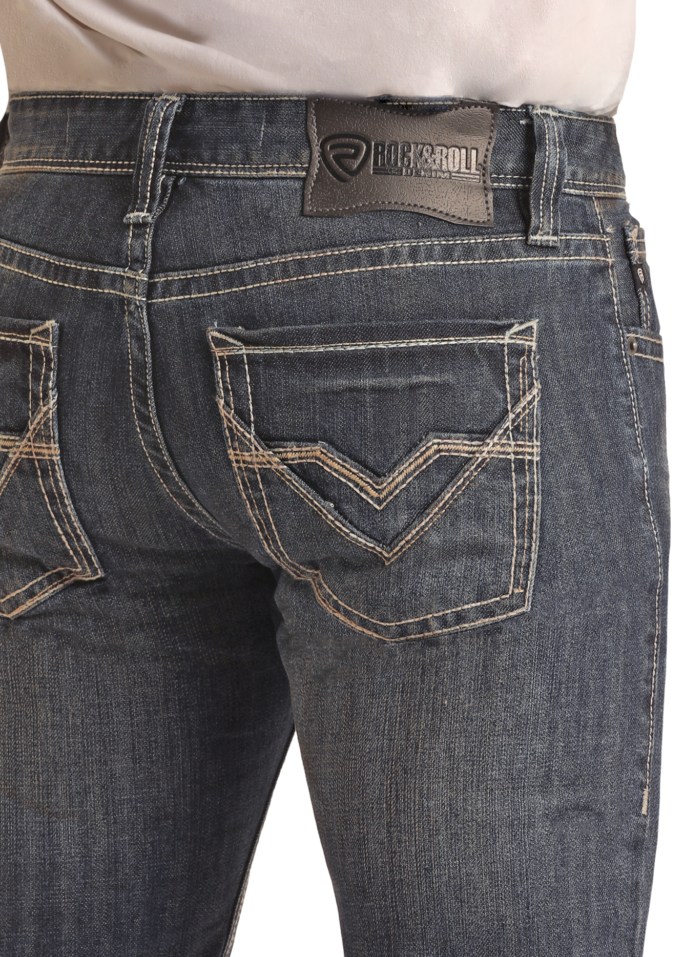 A person wearing Rock & Roll Denim Regular Fit Stackable Boot Jeans in dark blue, featuring durable fabric, decorative back pocket stitching, and a branded leather patch on the waistband. The image shows the back view.