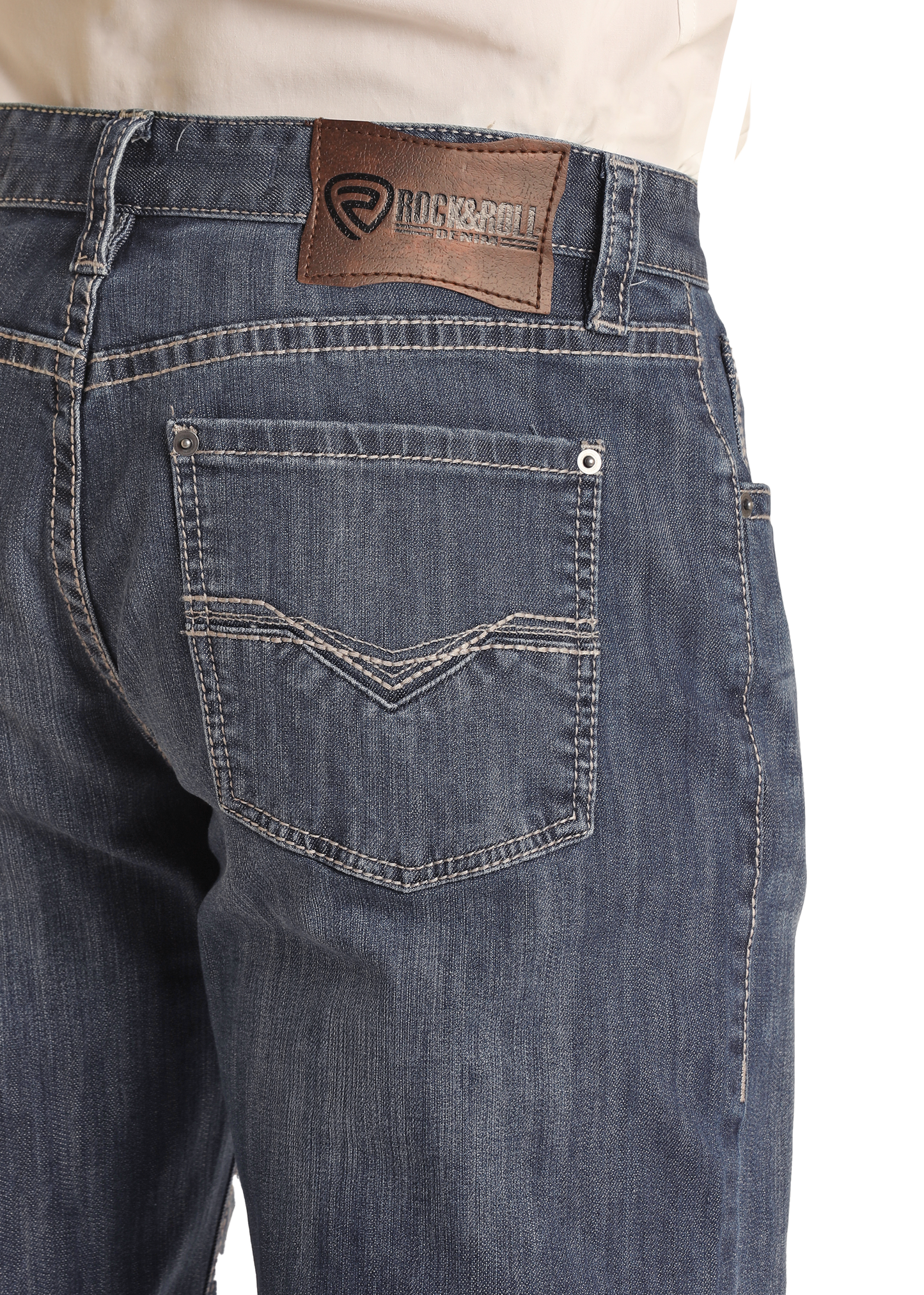 A close-up of Rock & Roll Denim Relaxed Fit Dark Wash Stackable Bootcut Jeans, showcasing their comfortable stretch fabric for everyday wear.