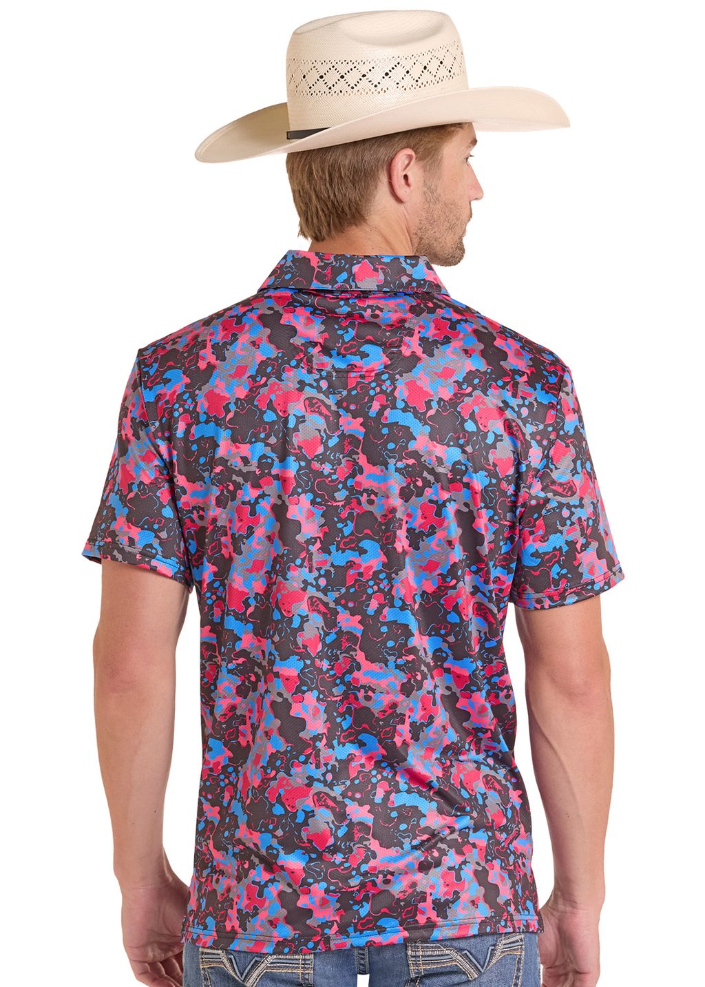 Man wearing a colorful patterned shirt and cowboy hat on a white background