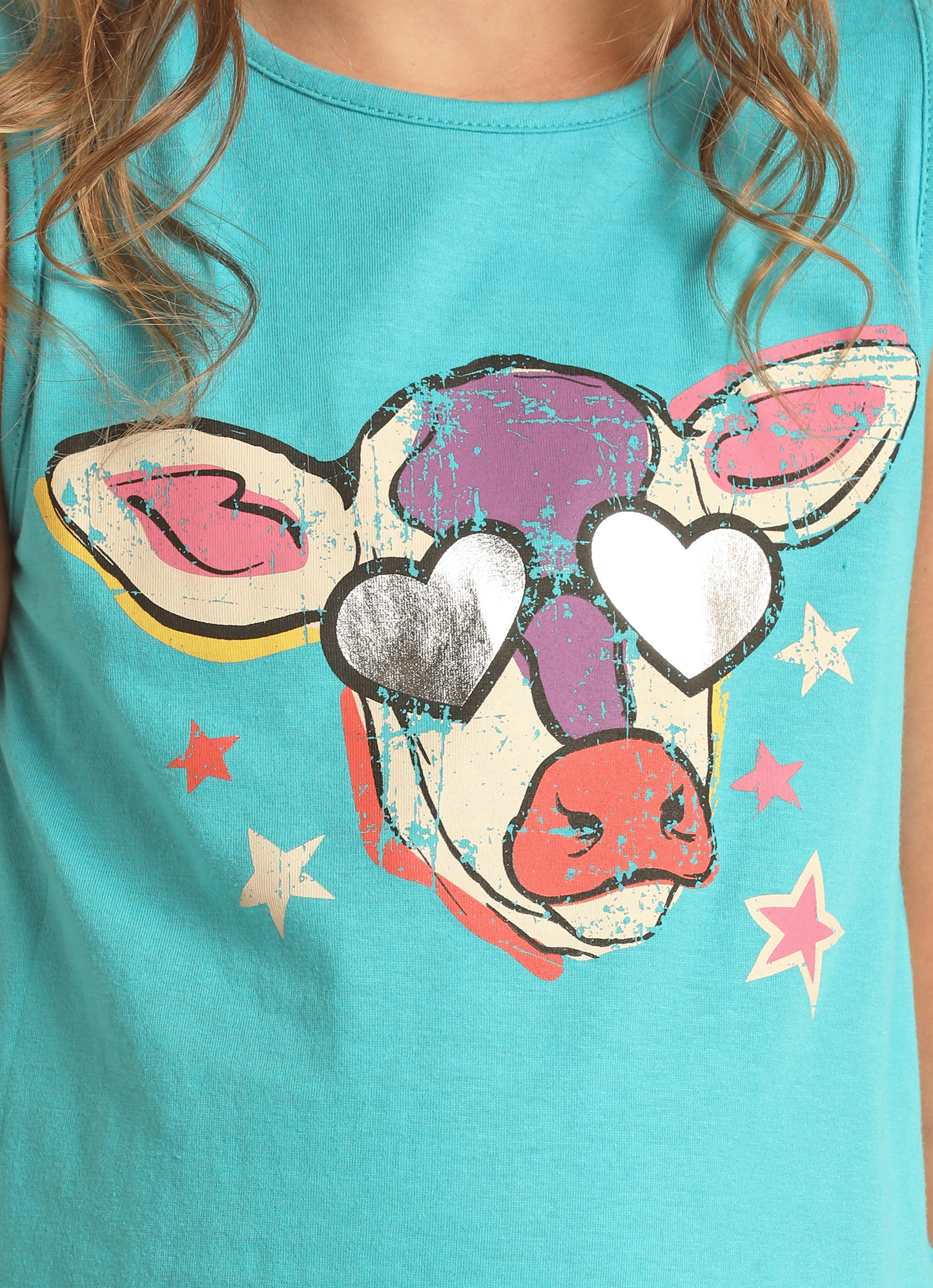 The Rock & Roll Denim Girls' Cow Graphic Tank features a turquoise color and a colorful cow graphic with metallic heart-shaped sunglasses, surrounded by white and pink stars.