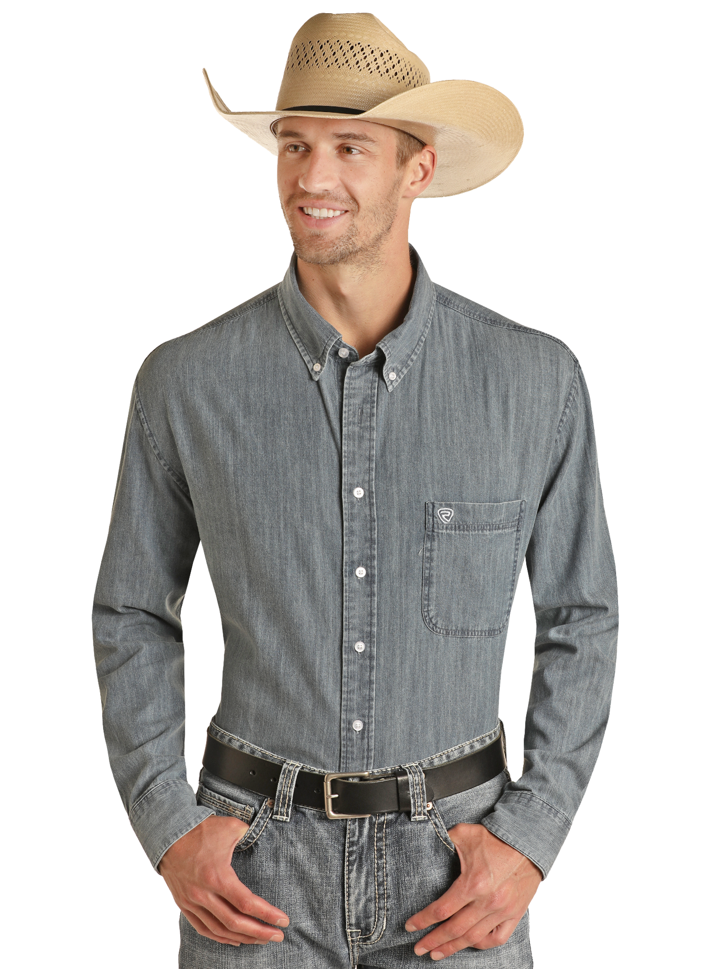 A man smiles against a plain background wearing the Rock & Roll Denim Long Sleeve Button Shirt, paired with jeans, a light brown cowboy hat, and a black belt.