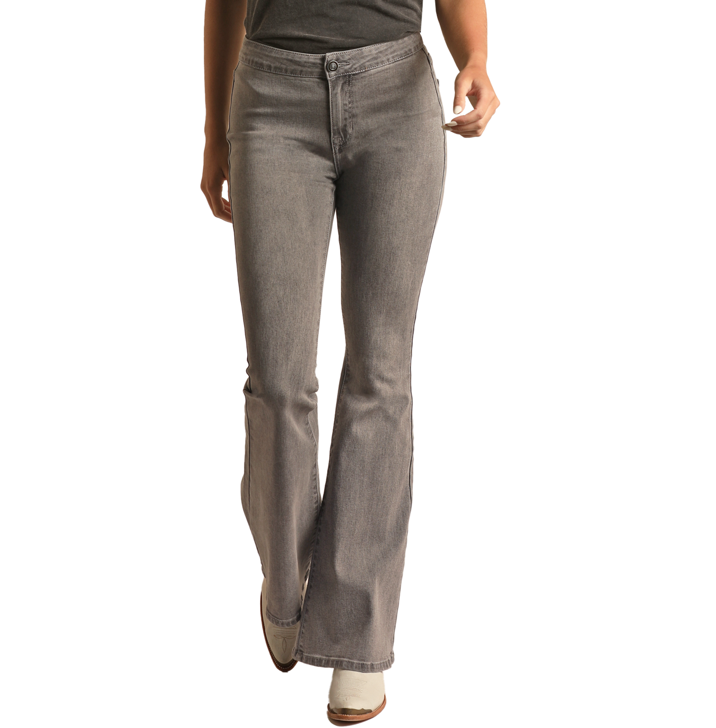 A person wearing Rock & Roll Denim Grey Wash High Rise Flare Jeans with a zip fly and dark top walks forward. Only their lower half is visible against a white background, showcasing modern style with western sophistication.
