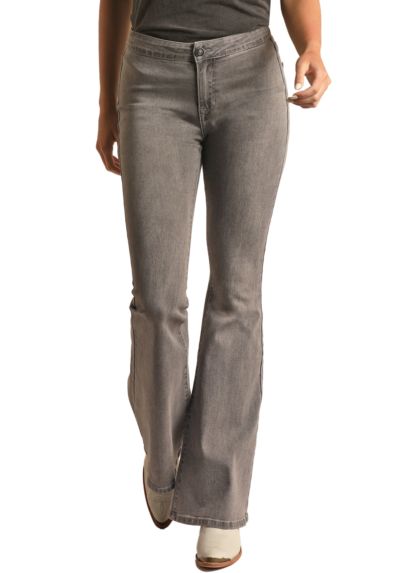 A person wearing Rock & Roll Denim Grey Wash High Rise Flare Jeans with a zip fly and dark top walks forward. Only their lower half is visible against a white background, showcasing modern style with western sophistication.