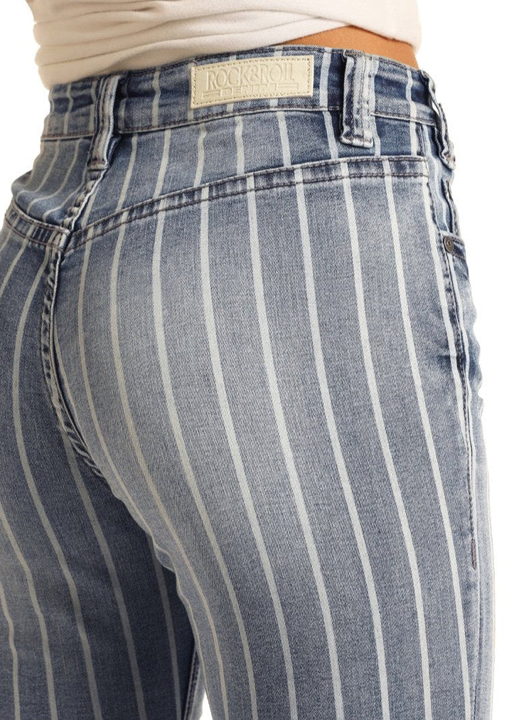 A person is shown from the back wearing Rock & Roll Denim High Rise Extra Stretch Striped Trousers in blue and white vertical stripes, set against a plain white background.
