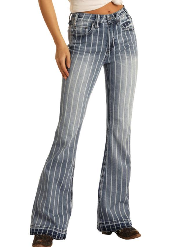 A person wearing Rock & Roll Denim High Rise Extra Stretch Striped Trousers in blue with vertical white stripes, styled with a white cropped top and brown shoes.