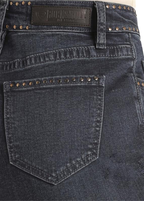 Close-up of dark blue jeans with studded details and a brand label.