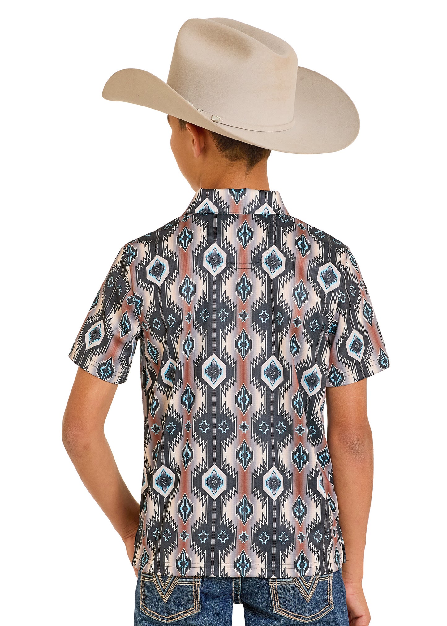 Child wearing a patterned shirt and cowboy hat on a white background