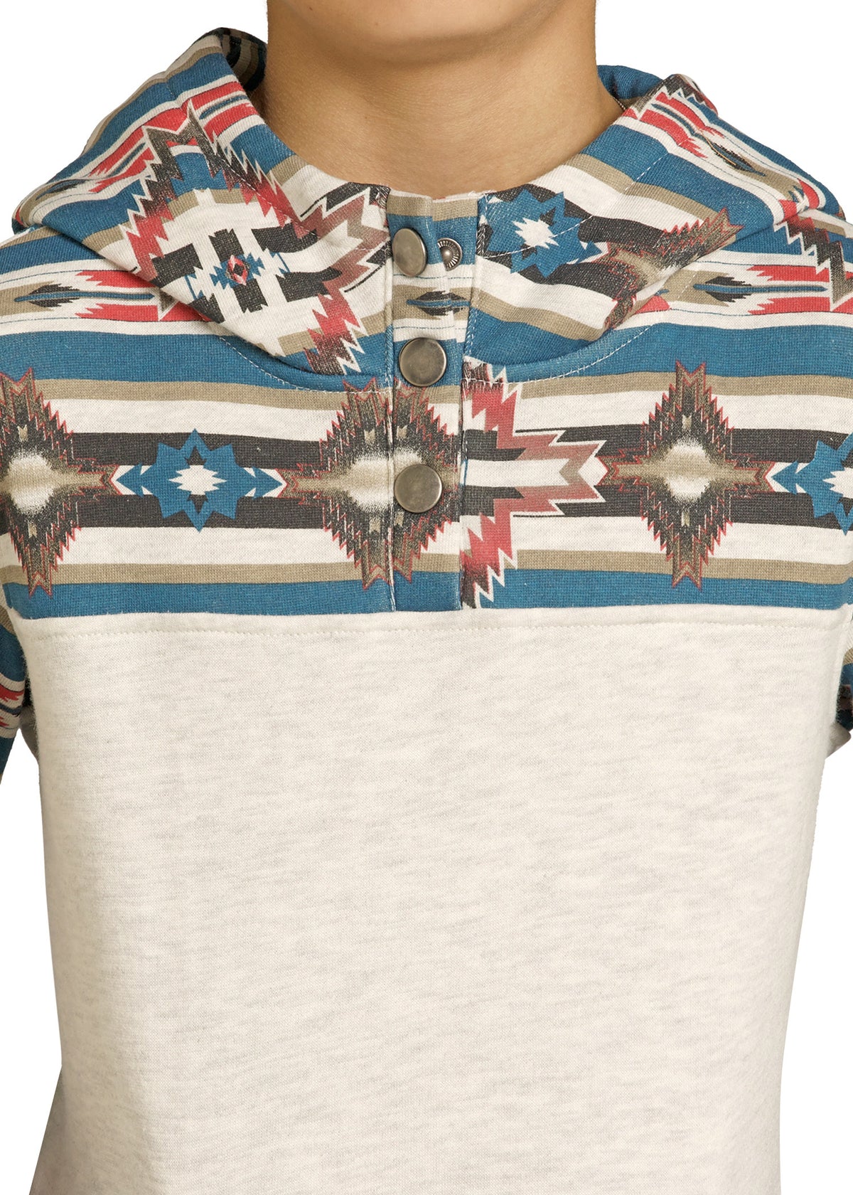 Close-up of a patterned shirt with a focus on the collar and buttons.
