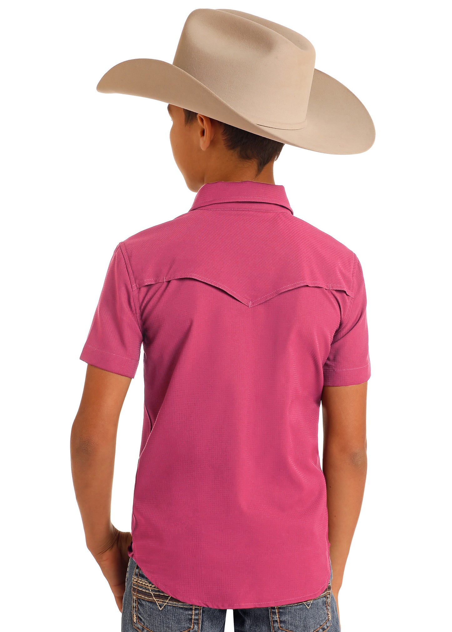 Person wearing a pink shirt and beige cowboy hat on a white background