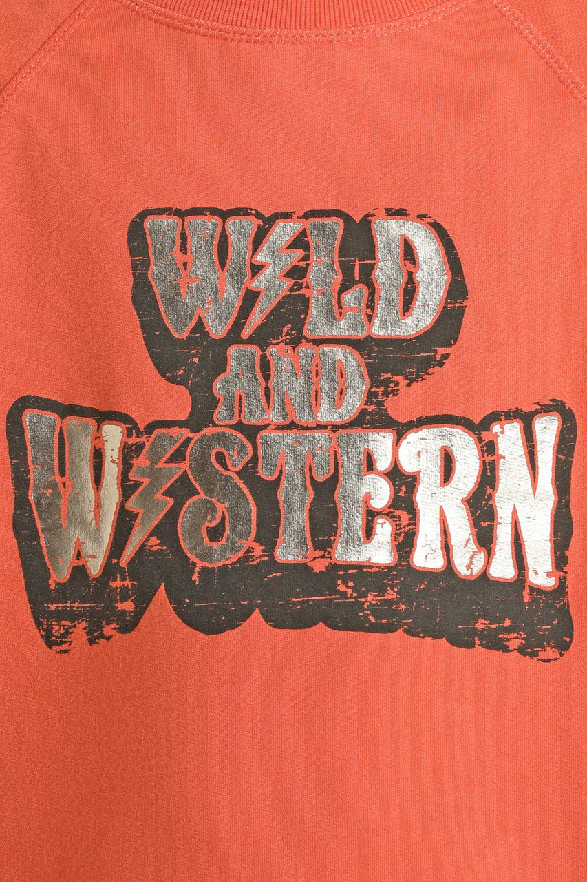 The Girls' Wild and Western Graphic Pullover by Rock & Roll Denim features orange fabric and a vintage-style "WILD AND WESTERN" print with bold lightning bolts—perfect for standout, everyday style.