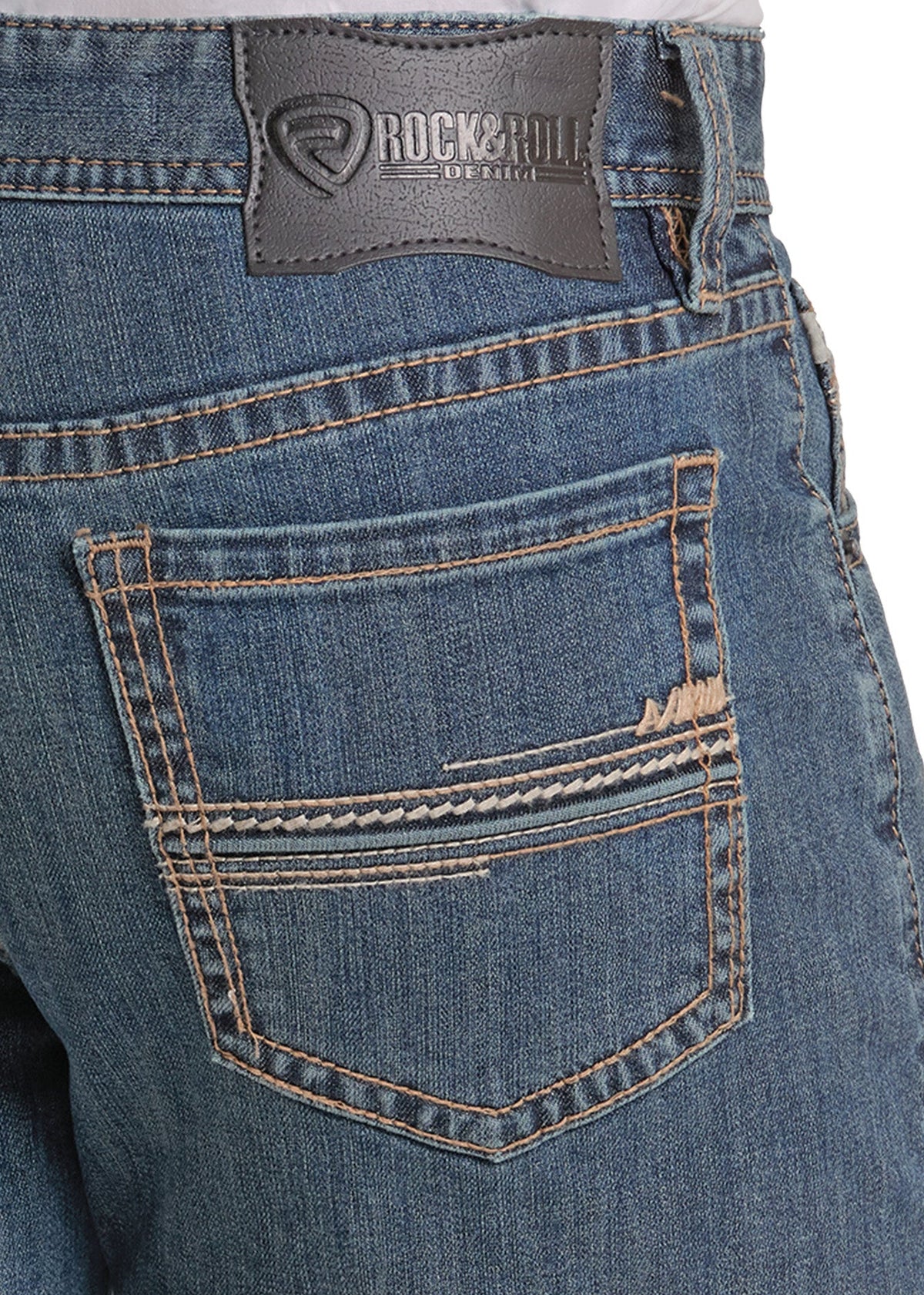 Close-up of the back waistband and pocket area of blue denim jeans, showing a dark gray Rockroll brand patch and contrast stitching.