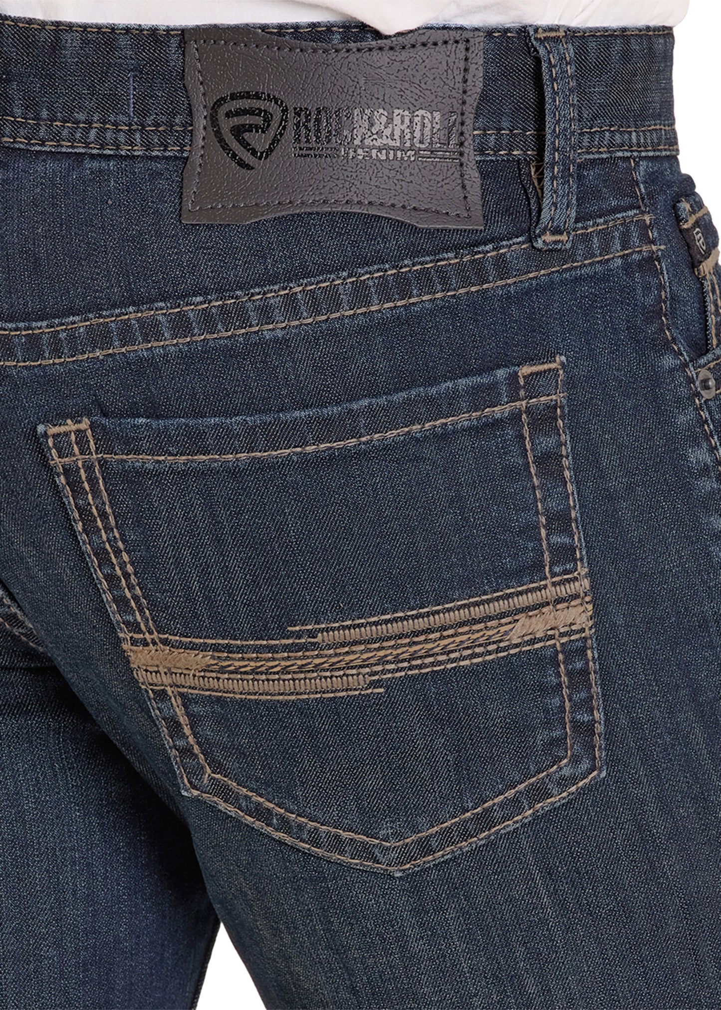 Close-up of blue jeans with a brand label on the pocket