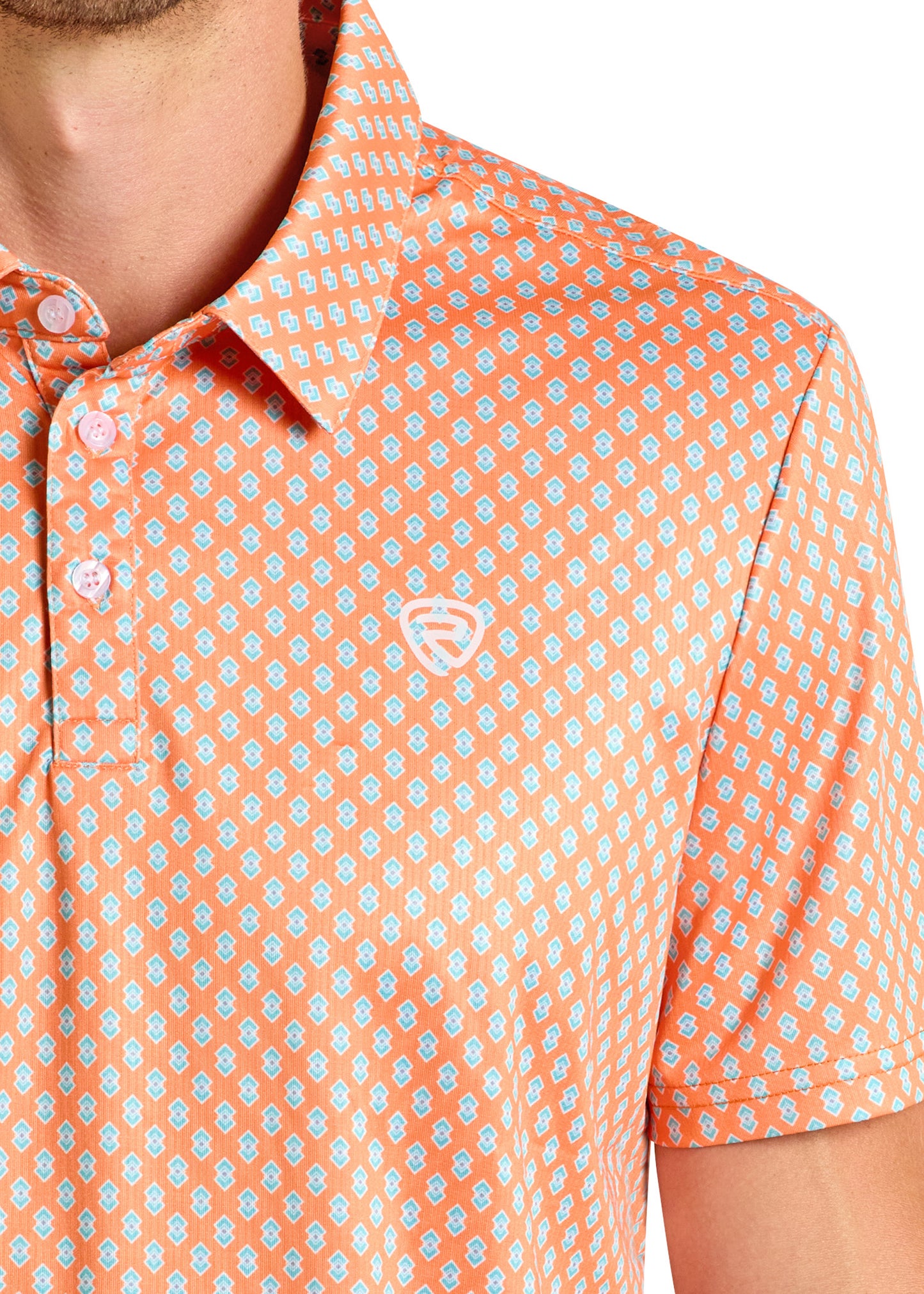 A close-up shows a person wearing the Rock & Roll Denim Geo Polo in orange, featuring a white and light blue geometric pattern, small white embroidered logo on the chest, collar, buttons, and a comfortable regular fit. Only part of their face is visible.