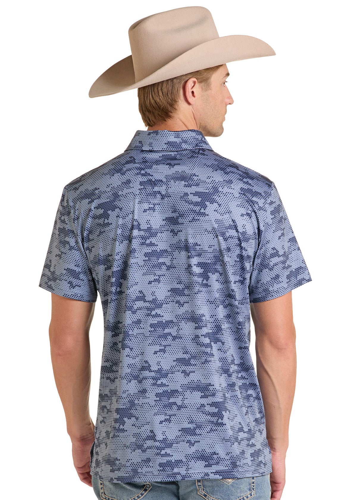 A man wearing a blue and gray digital camouflage short-sleeve button-down shirt, shown from the back. He is also wearing a beige cowboy hat and light-wash jeans, photographed against a solid white background.