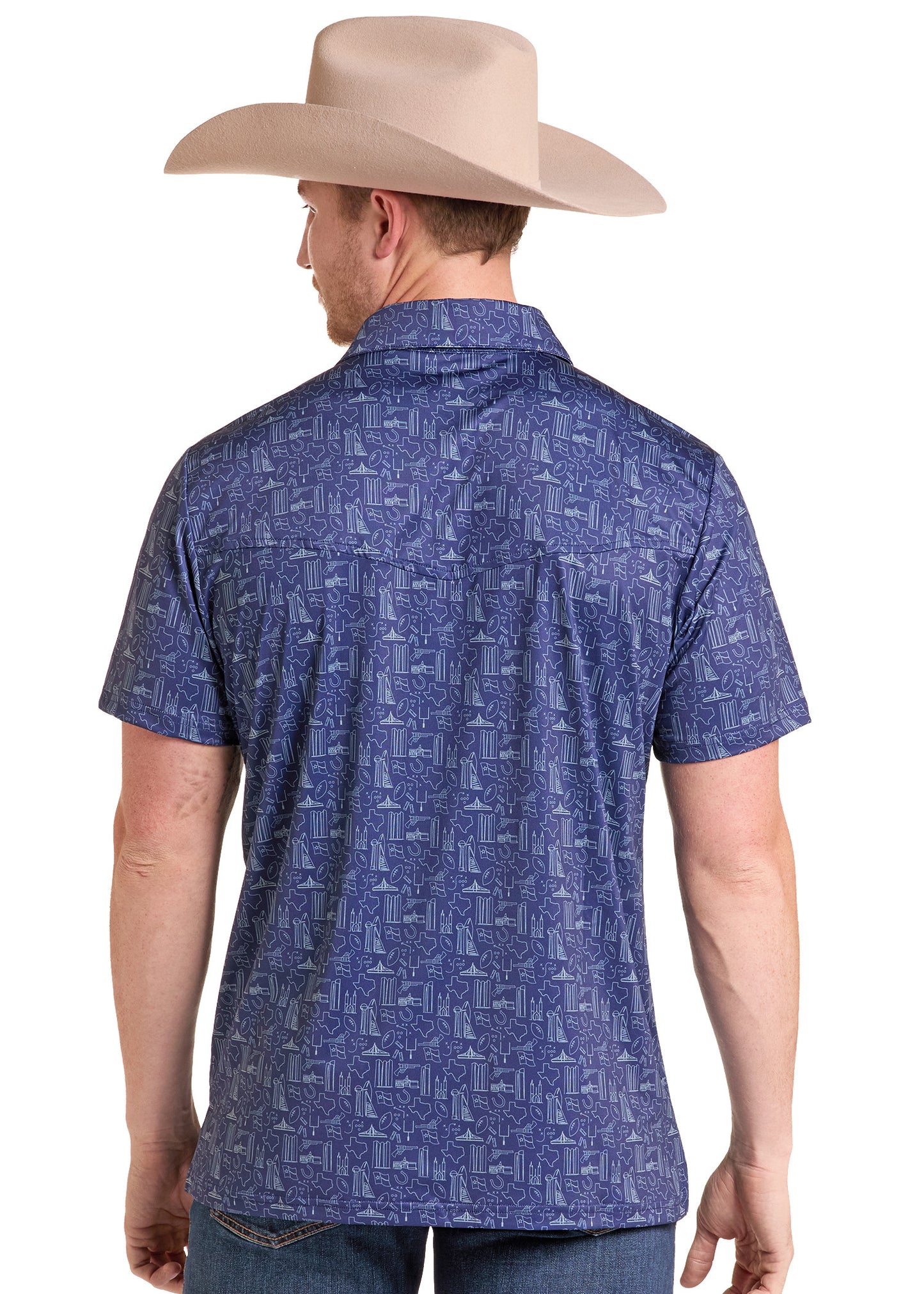 A man viewed from the back wearing a blue short-sleeve button-up shirt with a white geometric pattern, paired with a beige cowboy hat and blue jeans, against a plain white background.