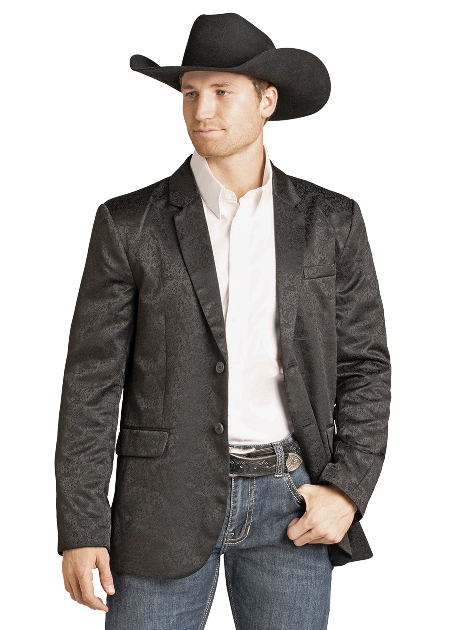 Man wearing a Rock & Roll Denim Black Paisley Jacquard Sport Coat, black cowboy hat, white shirt, blue jeans with a large belt buckle, standing with one hand in his pocket and looking to the side against a white background.