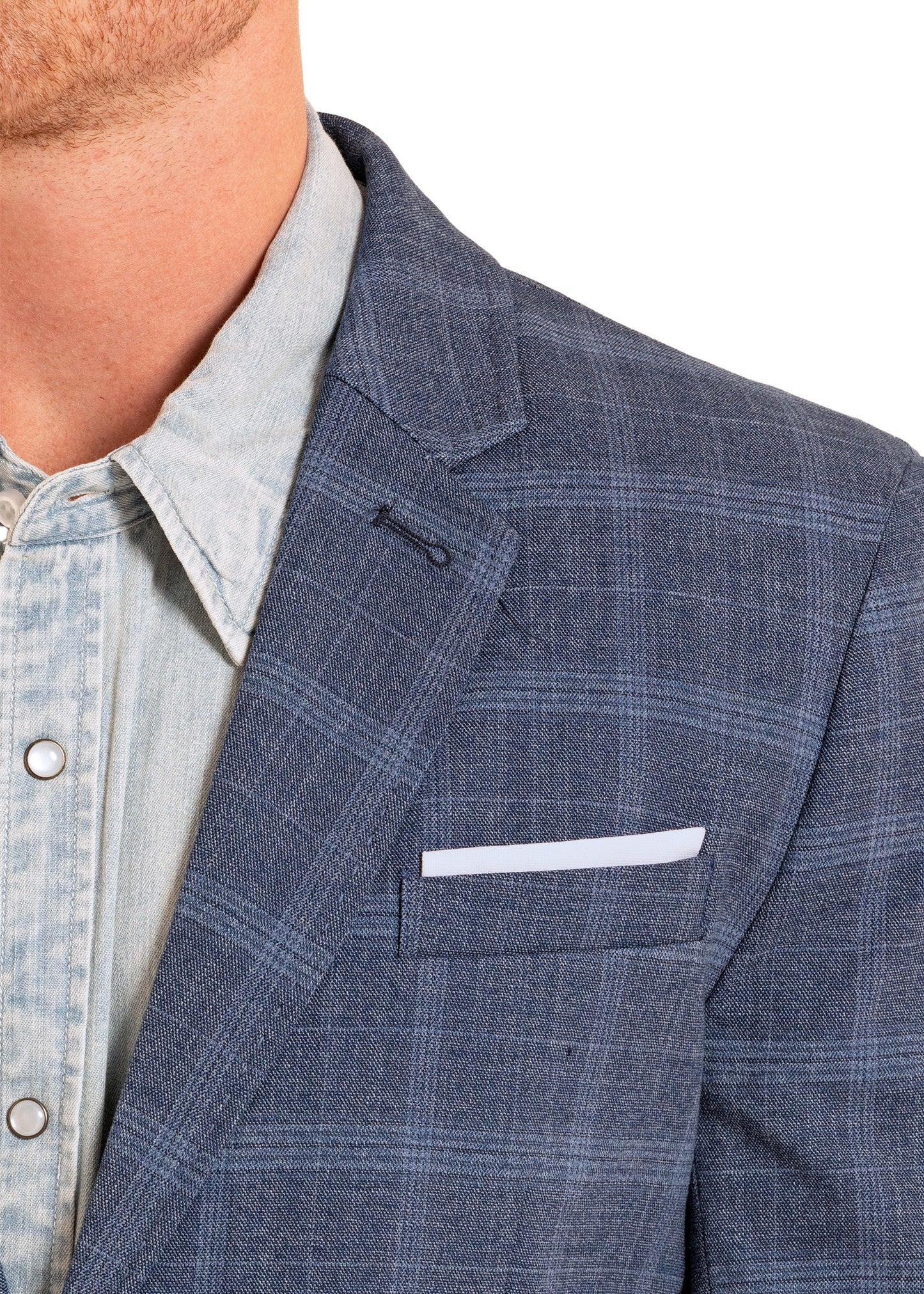 Close-up of a blue checkered blazer with a light blue shirt underneath on a white background