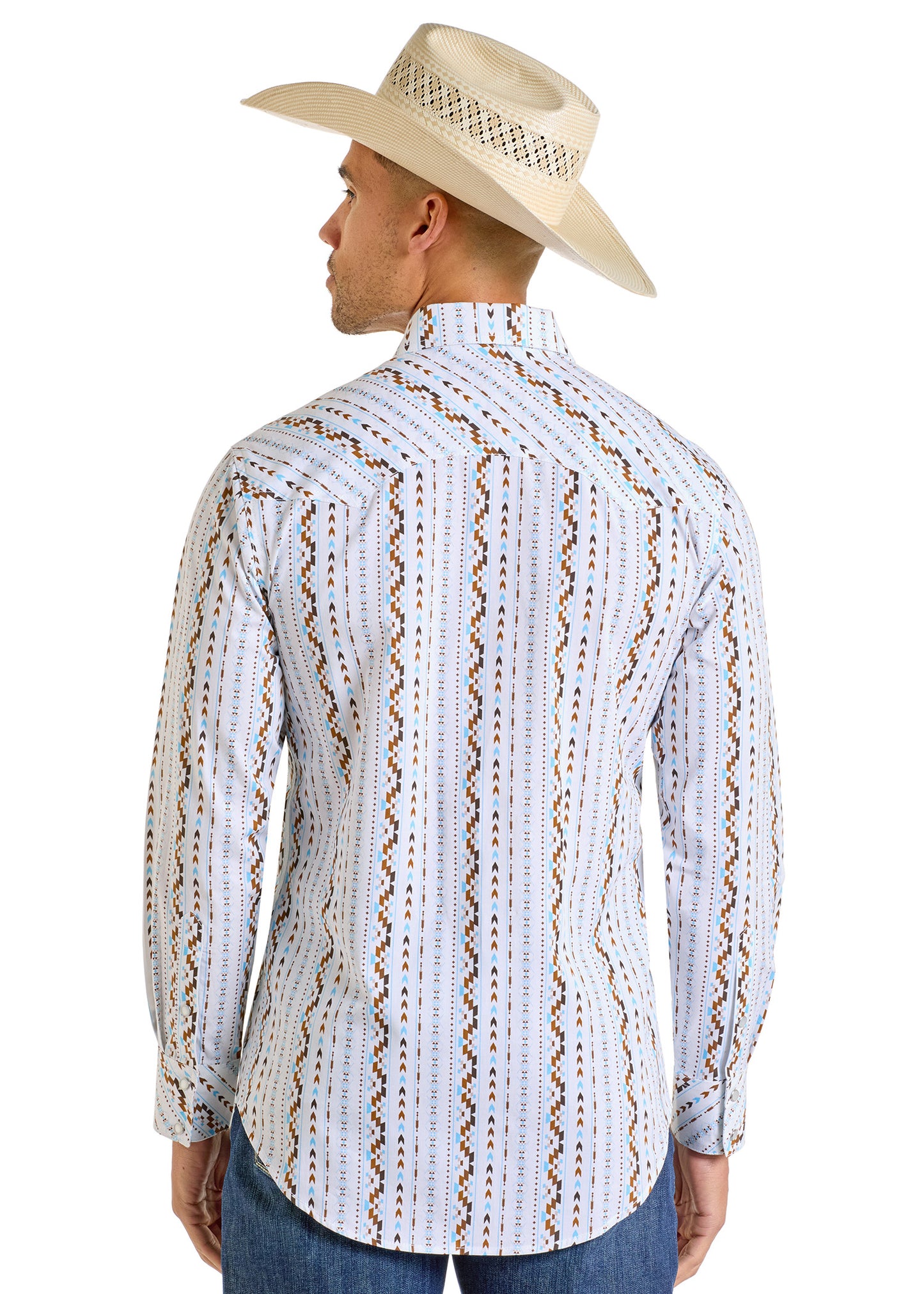 A man is seen from the back against a white background wearing a Rock & Roll Denim Slim Fit Digital Aztec Long Sleeve Snap Shirt, blue jeans, and a beige straw cowboy hat.
