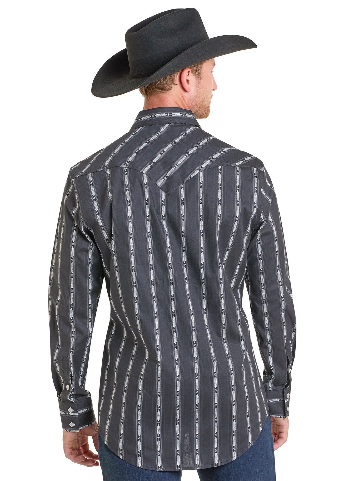 A man in a black cowboy hat and a Rock & Roll Denim Slim Fit Vertical Stripe Long Sleeve Snap Shirt with white vertical stripes stands facing away from the camera.