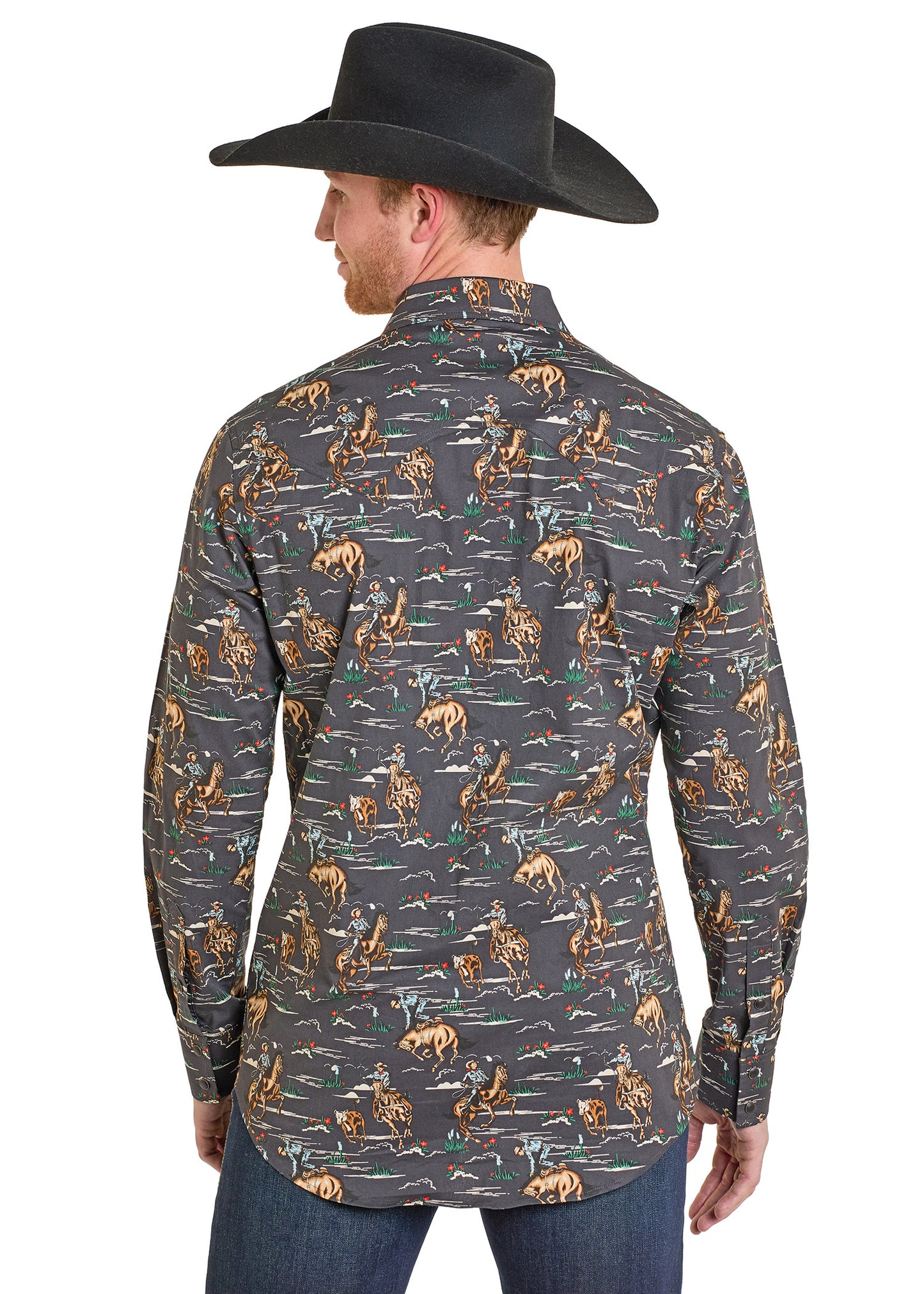 Man wearing a patterned shirt with long sleeves and a black cowboy hat on a white background