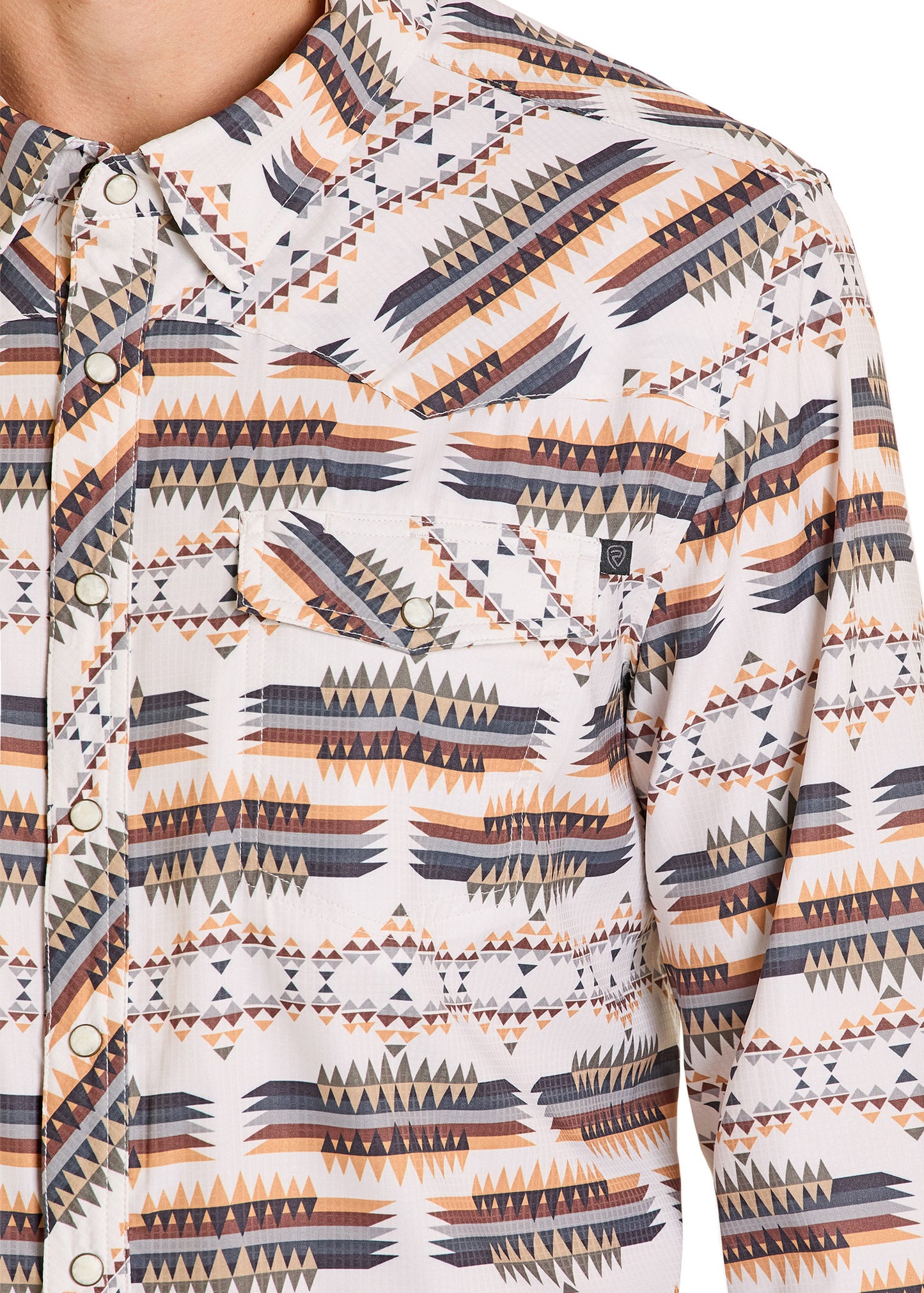 Close-up of a patterned shirt with geometric design